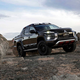 Illustration for article titled The Mitsubishi Triton Absolute Will Not Apologize for All That Carbon Fiber